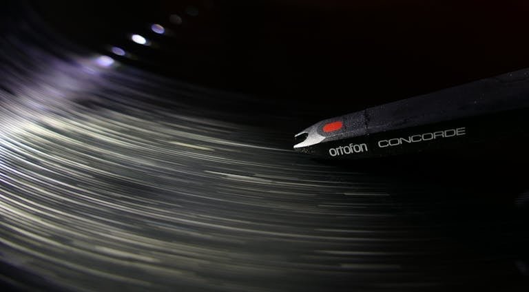 Close-Up Shot of a Spinning Music Disc